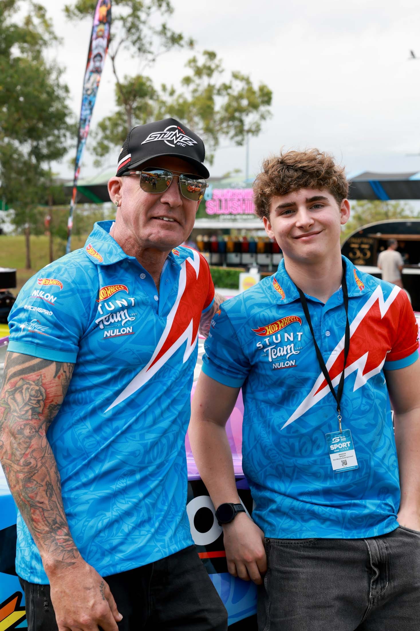 Hot Wheels Stunt Team members posing together in the Darwin Triple Crown fan zone.