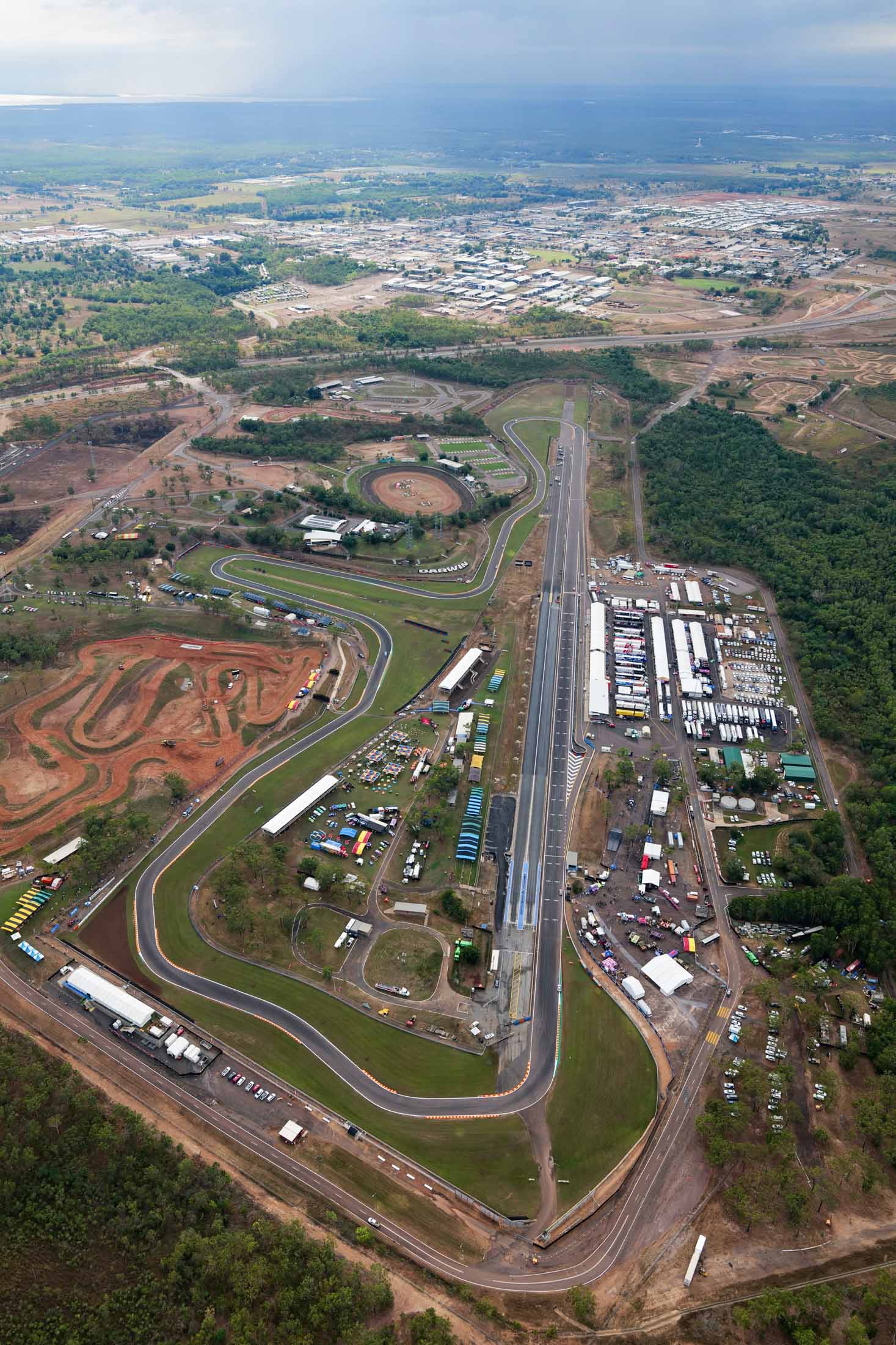 Aerial view of Hidden Valley Raceway and surrounding Darwin event precinct, showing the circuit, pit area and nearby motocross tracks.